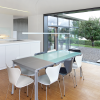 csm_Living_room_Pegnitz_63ce6d797e Nanos bele notranje barve KEIM Innotop na steno v svetlem prostoru.
